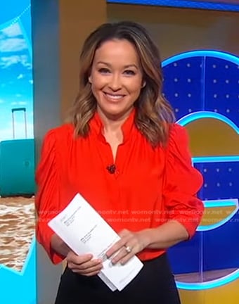 Eva's orange ruched sleeve top on Good Morning America