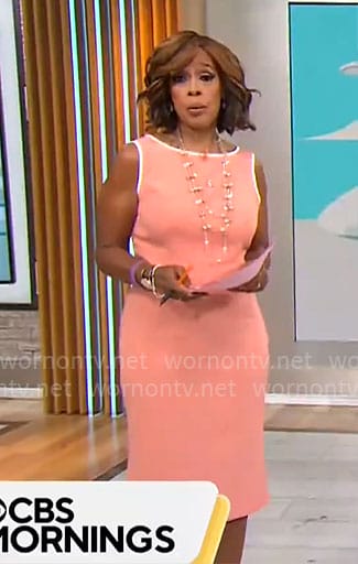 Gayle King’s coral sheath dress with white trims on CBS Mornings