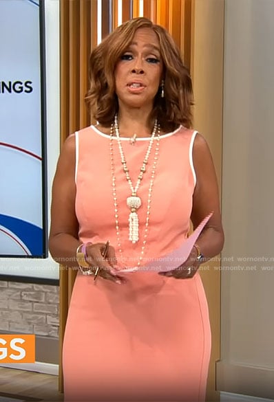 Gayle King’s coral sheath dress with white trims on CBS Mornings