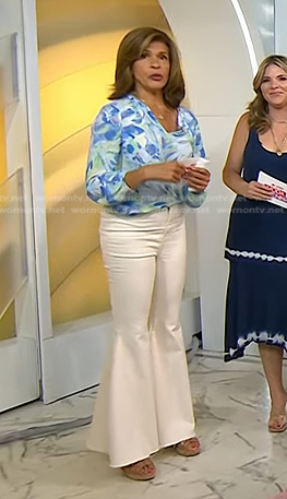 Hoda's blue print tie neck top and white flare pants on Today