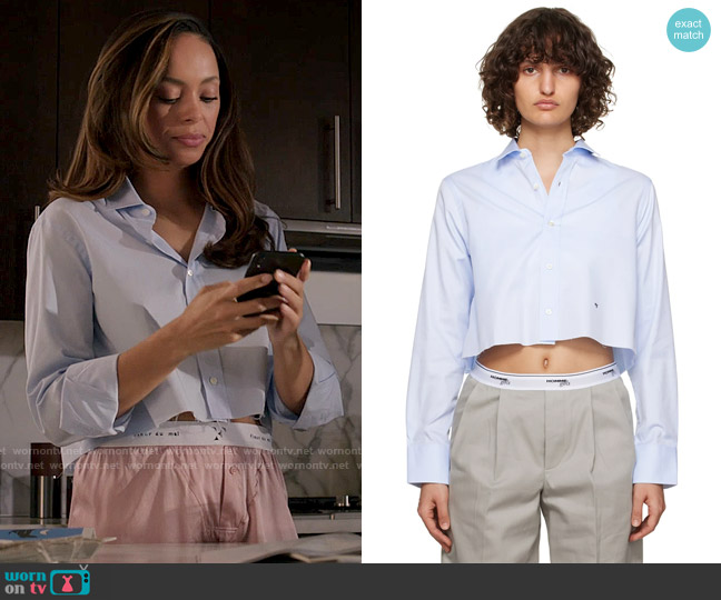 Whitney’s blue cropped shirt on Run the World