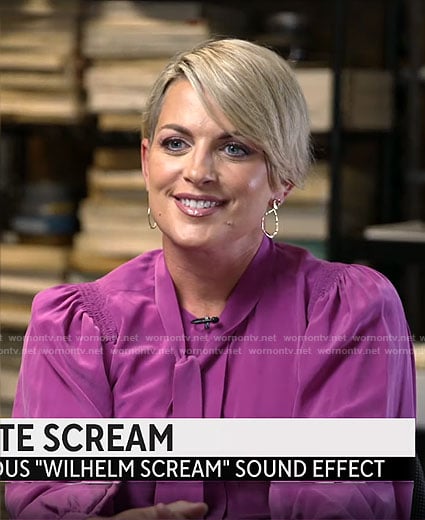 Jamie Yuccas's magenta tie neck blouse on CBS Mornings