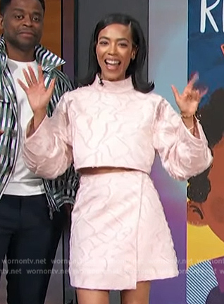 Jazmyn's pink textured top and skirt on Access Hollywood