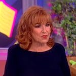 Joy’s navy braided trim sweater top on The View