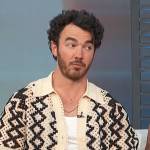 Kevin Jonas’s knit cardigan on Access Hollywood