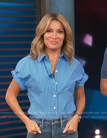 Kit’s blue striped short sleeve top on Access Hollywood