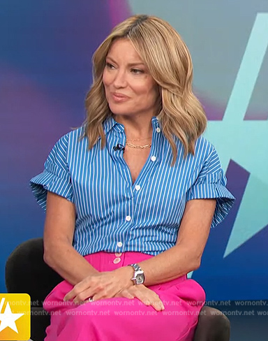 Kit’s blue striped short sleeve top on Access Hollywood