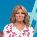 Kit’s white floral v-neck top on Access Hollywood