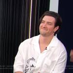 Logan Henderson’s white embroidered shirt on E! News