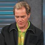 Michael Shannon’s black zip down jacket on Access Hollywood