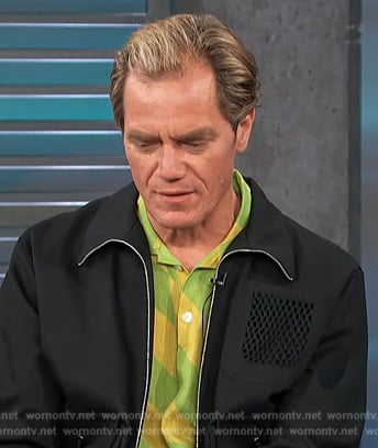 Michael Shannon’s black zip down jacket on Access Hollywood