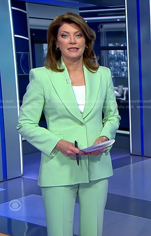 Norah’s mint green pant suit on CBS Evening News