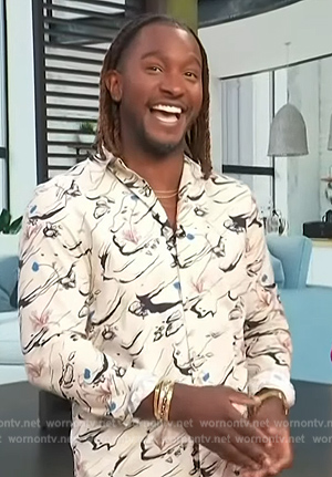 Scott's white abstract print shirt on Access Hollywood