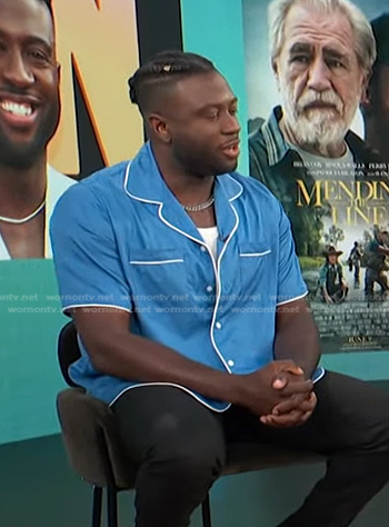 Sinqua Walls's blue shirt with white piping on Access Hollywood