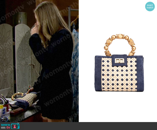 Soli & Sun The Mila Navy Blue & Gold Rattan Woven Handbag worn by Hope Logan (Annika Noelle) on The Bold and the Beautiful