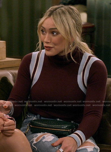 Sophie's burgundy striped shoulder sweater on How I Met Your Father