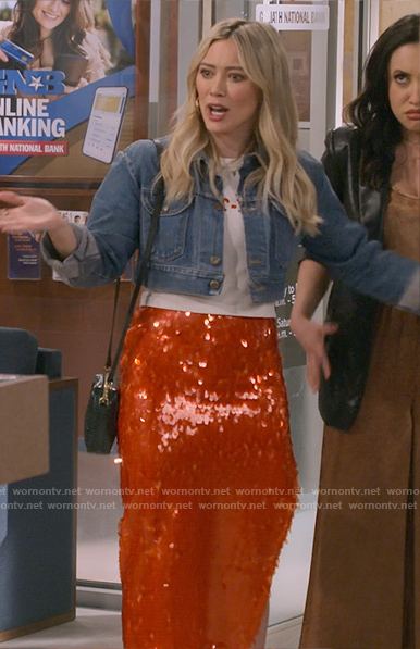 Sophie's cropped denim jacket and red sequin skirt on How I Met Your Father