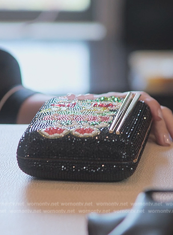 Kourtney's black embellished sushi bag on The Kardashians