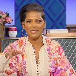 Tamron’s floral print belted dress on Tamron Hall Show