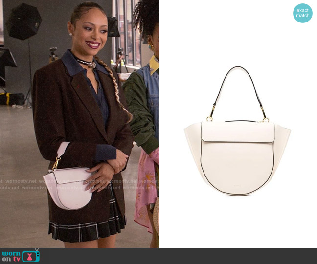 Whitney’s white bag on Run the World