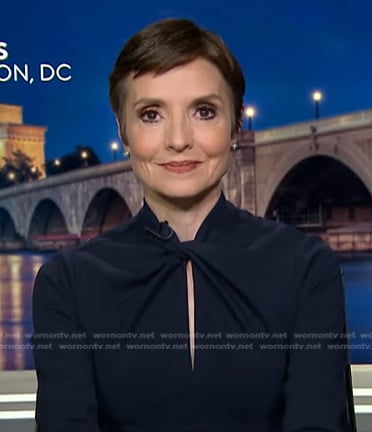 Catherine Herridge’s navy twist neck dress on CBS Evening News