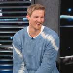 Alexander Ludwig’s blue tie dye sweater on Access Hollywood