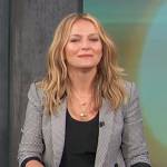 Beckie Newton’s houndstooth print blazer on Access Hollywood