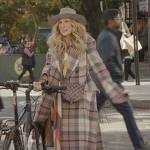 Carrie’s plaid coat and stripe dress on And Just Like That