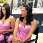 Brie Garcia’s pink feather trim mini dress on E! News