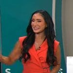 Elizabeth Werner’s orange wrap jumpsuit on CBS Mornings