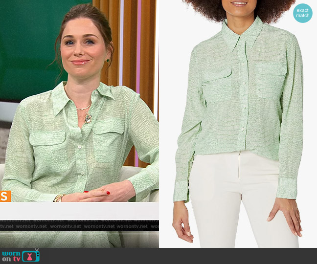 Equipment Slim Signature Blouse in Nature White Jadesheen worn by Laura Modi on CBS Mornings