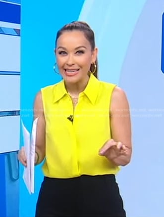 Eva’s yellow sleeveless collar shirt on Good Morning America