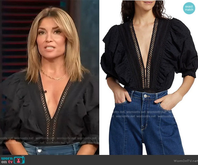 WornOnTV: Kit's black plunging lace trim top on Access Hollywood