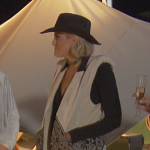 Gina’s white embroidered vest on The Real Housewives of Orange County