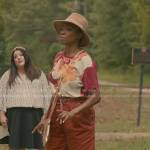 Helen’s floral top and brown stitched pants on Sweet Magnolias