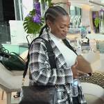 Kandi’s gray checked coat  on The Real Housewives of Atlanta