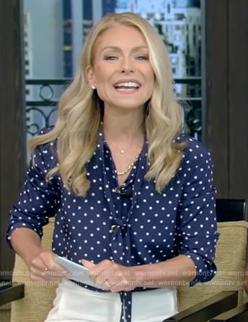 Kelly’s blue polka dot tie neck blouse on Live with Kelly and Mark