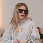 Khloe’s gray butterfly embroidered hoodie on The Kardashians