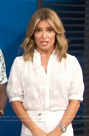 Kit’s white short sleeve embroidered shirt on Access Hollywood