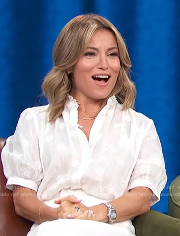 Kit’s white short sleeve embroidered shirt on Access Hollywood