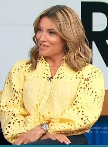 Kit's yellow lace blouse on Access Hollywood
