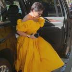 Kris’s yellow ruffle off shoulder dress on The Kardashians