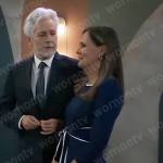 Lucy’s navy tie waist dress with white trim on General Hospital