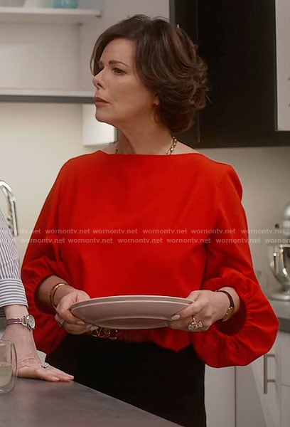 Margaret's red balloon sleeve blouse on So Help Me Todd