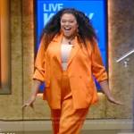 Michelle Buteau’s orange satin blazer on Live with Kelly and Mark