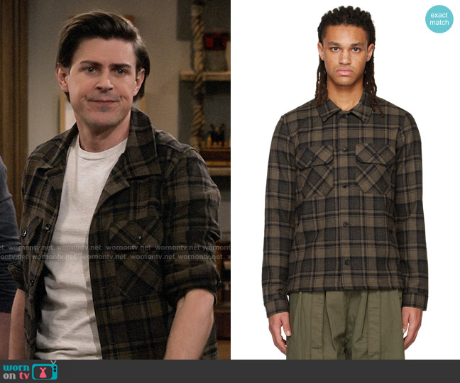 Jesse’s brown plaid shirt on How I Met Your Father