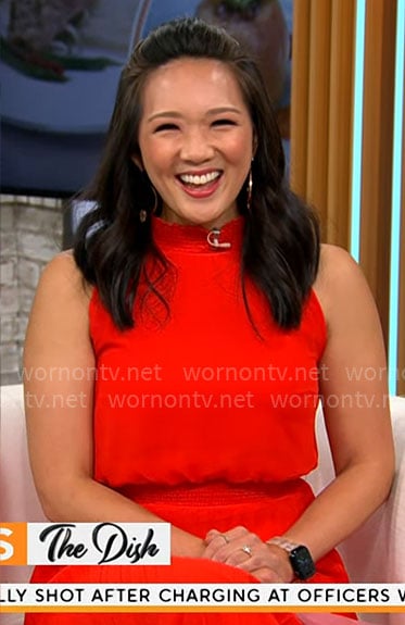 Nancy Chen’s red pleated sleeveless dress on CBS Mornings