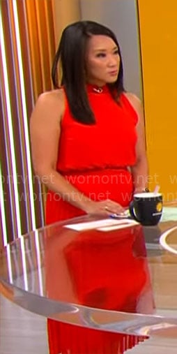 Nancy Chen’s red pleated sleeveless dress on CBS Mornings