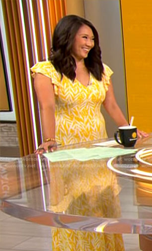 Nancy Chen’s yellow printed v-neck dress on CBS Mornings