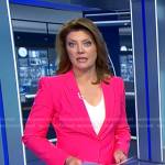 Norah’s fuchsia pink suit on CBS Evening News